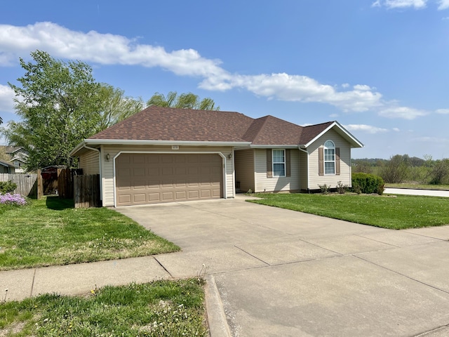418 N Harrington Dr, Republic, MO 65738 - ranch-style house with driveway, fence, an attached garage, a shingled roof, and a front yard