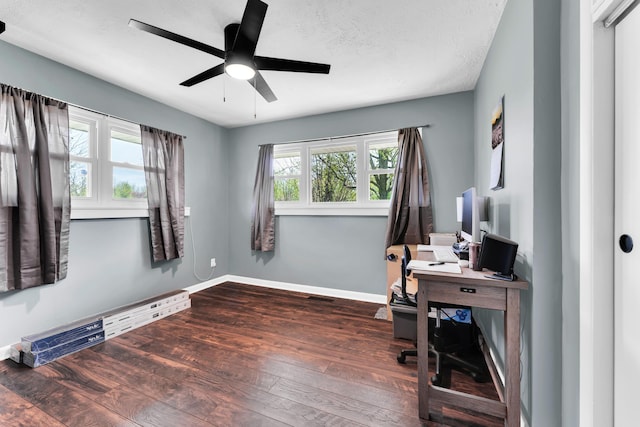 office area featuring wood finished floors, baseboards, and ceiling fan
