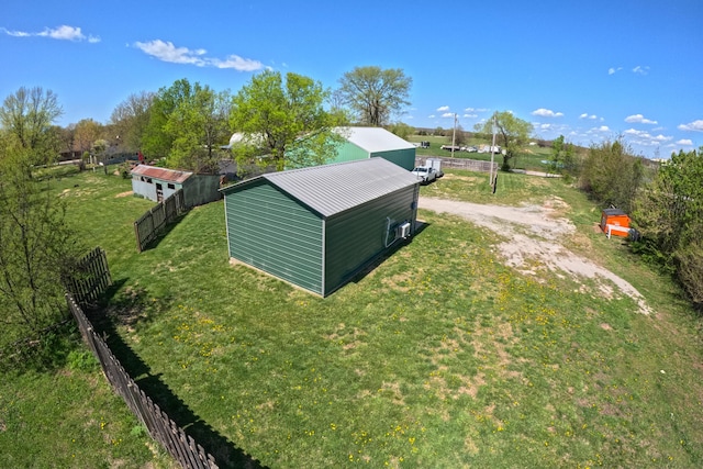 birds eye view of property featuring a rural view