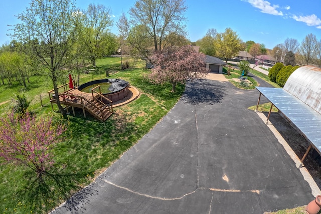 surrounding community with driveway