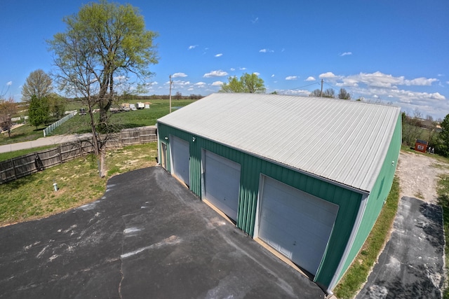 detached garage with fence