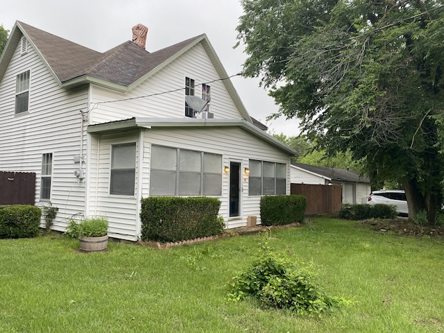 115 E Montgomery St, Fairview, MO 64842 - view of front of home with a shingled roof and a chimney