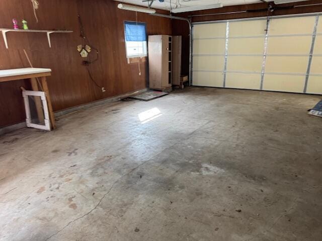 garage with wood walls
