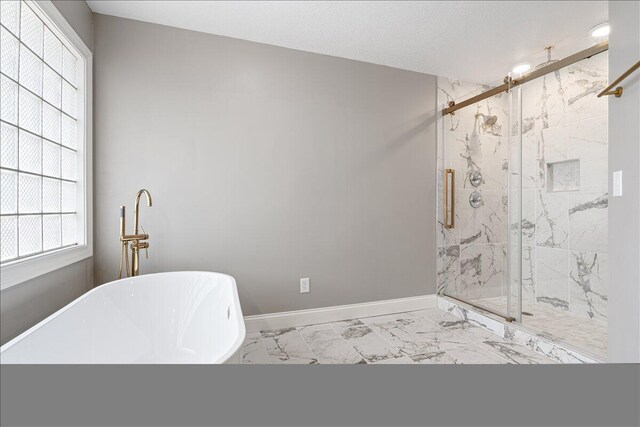 101 Poindexter Dr, Pineville, MO 64856 - full bath with marble finish floor, baseboards, a freestanding bath, and a marble finish shower