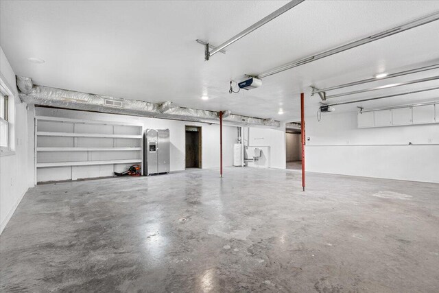 101 Poindexter Dr, Pineville, MO 64856 - garage featuring a garage door opener