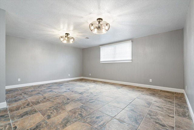 101 Poindexter Dr, Pineville, MO 64856 - spare room with baseboards and a textured ceiling