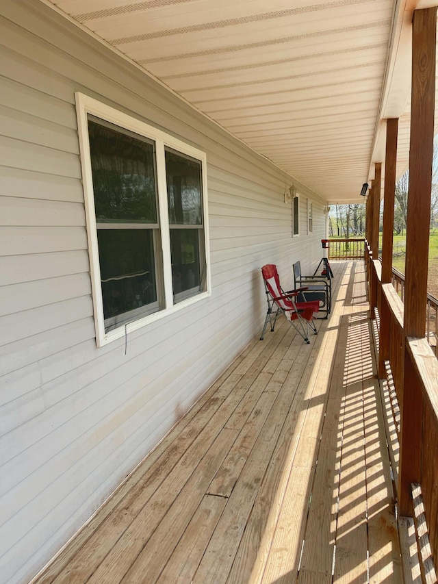 deck with covered porch
