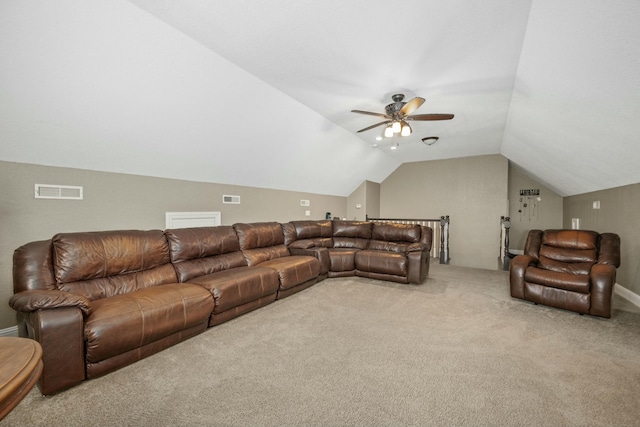 carpeted living room featuring lofted ceiling, a ceiling fan, and visible vents