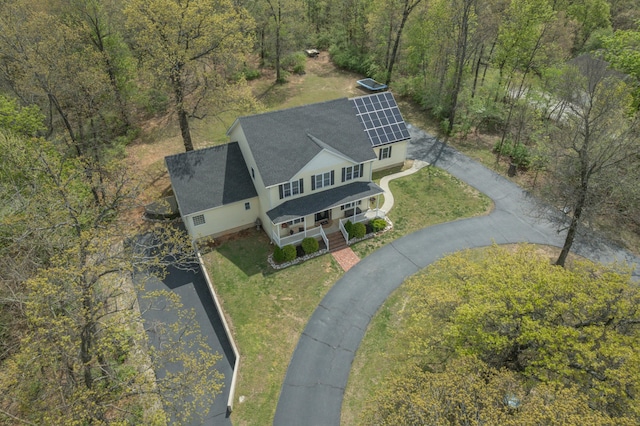 bird's eye view with a forest view