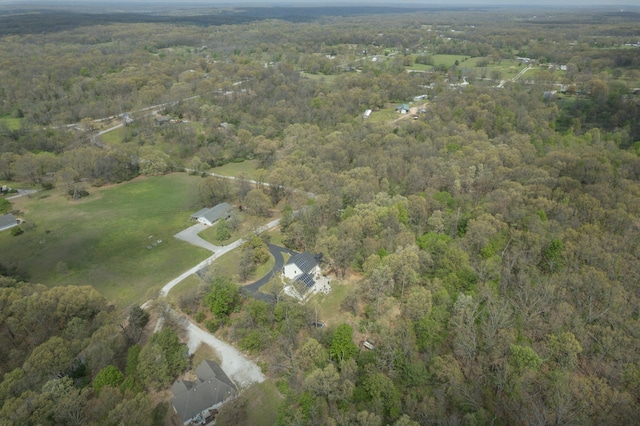 aerial view featuring a view of trees