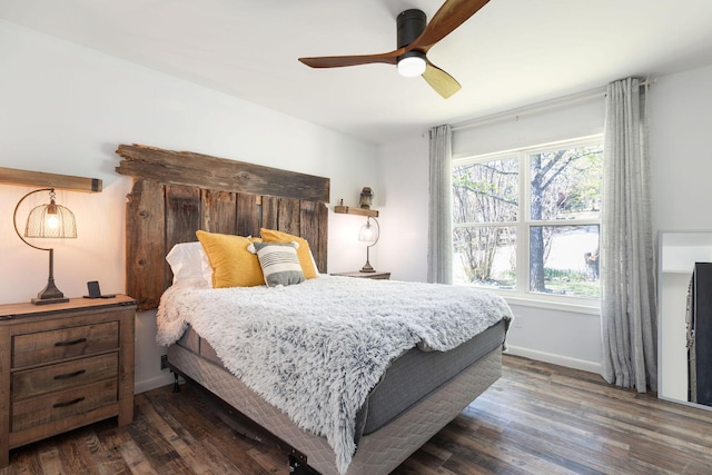 1 Edgemont Dr, Kimberling City, MO 65686 - bedroom with wood finished floors, a ceiling fan, and baseboards