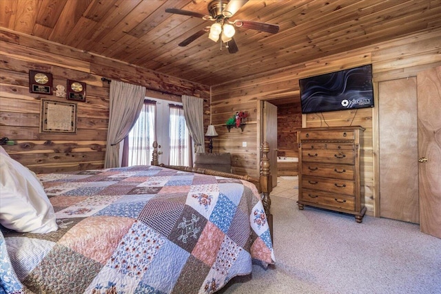 7745 Murr Rd, Graff, MO 65660 - bedroom featuring wood walls, access to exterior, french doors, wood ceiling, and carpet flooring