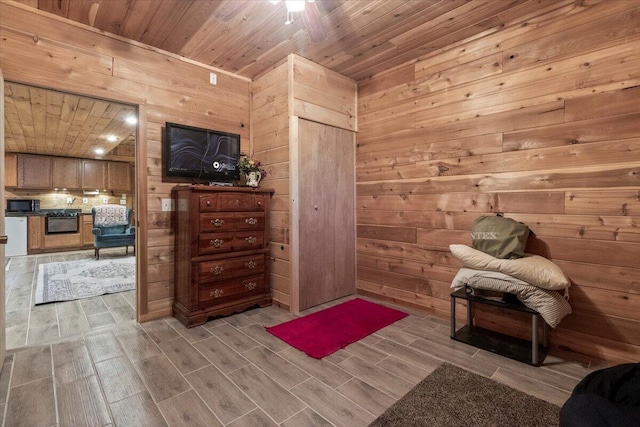 7745 Murr Rd, Graff, MO 65660 - interior space with wood ceiling, wood finish floors, and wood walls