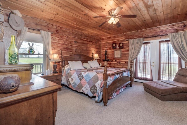 7745 Murr Rd, Graff, MO 65660 - carpeted bedroom featuring french doors, access to exterior, wooden walls, a ceiling fan, and wooden ceiling