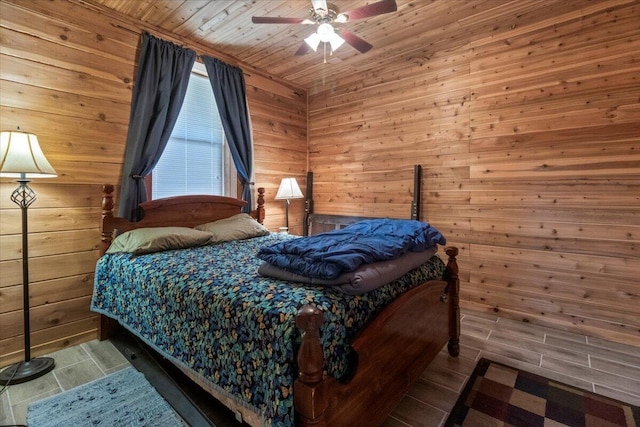 7745 Murr Rd, Graff, MO 65660 - bedroom featuring wood tiled floor, wood walls, wood ceiling, and ceiling fan