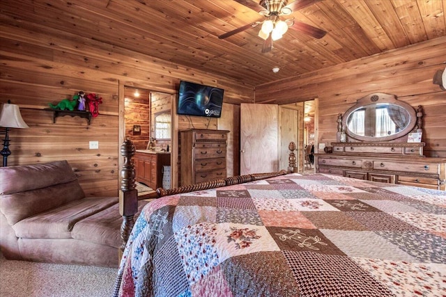 7745 Murr Rd, Graff, MO 65660 - bedroom with wood walls, wood ceiling, and ceiling fan