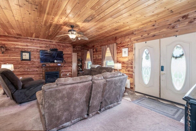 7745 Murr Rd, Graff, MO 65660 - living room with wood ceiling, a healthy amount of sunlight, and carpet flooring