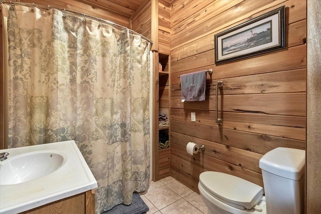 7745 Murr Rd, Graff, MO 65660 - bathroom featuring wood walls, tile patterned floors, vanity, toilet, and a shower with shower curtain