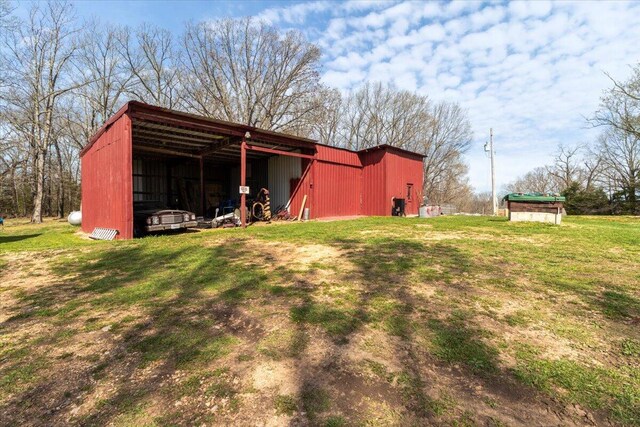 7745 Murr Rd, Graff, MO 65660 - view of pole building with a lawn