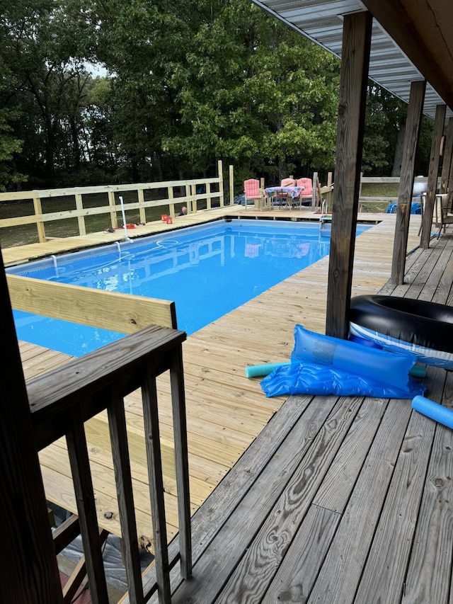 7745 Murr Rd, Graff, MO 65660 - view of swimming pool featuring fence, a fenced in pool, and a deck