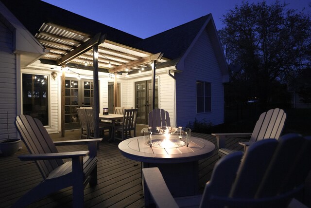 344 Zinnia Ln, Kirbyville, MO 65679 - wooden deck featuring french doors, a pergola, an outdoor fire pit, and outdoor dining area