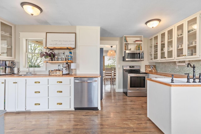 344 Zinnia Ln, Kirbyville, MO 65679 - kitchen with stainless steel appliances, open shelves, wood finished floors, and white cabinetry