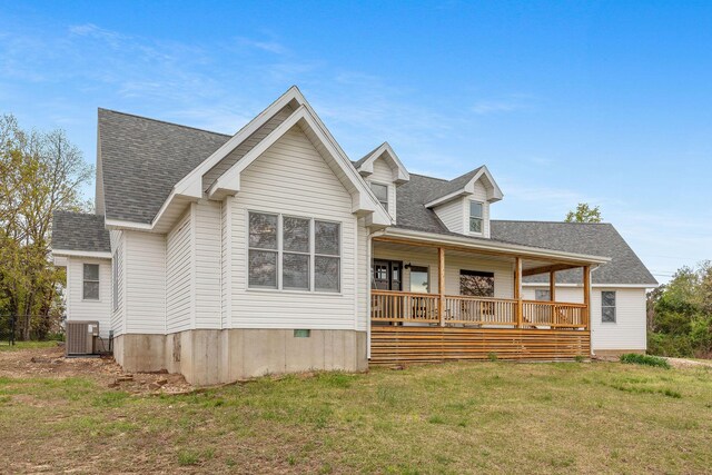 344 Zinnia Ln, Kirbyville, MO 65679 - rear view of house featuring a yard, a porch, cooling unit, and a shingled roof