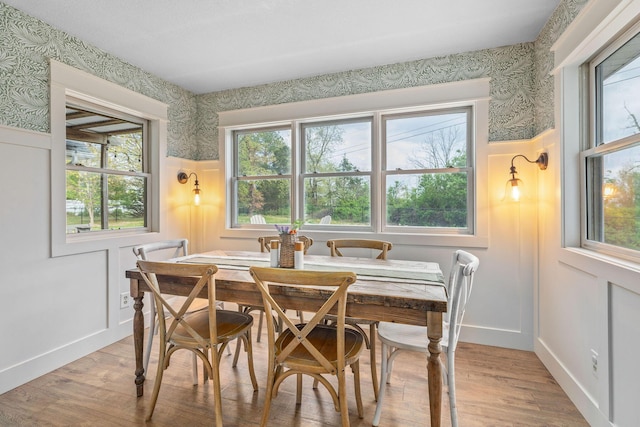344 Zinnia Ln, Kirbyville, MO 65679 - dining space featuring wallpapered walls, light wood-style floors, and plenty of natural light