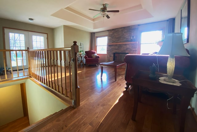 6475 S Farm Rd Unit 193, Rogersville, MO 65742 - corridor featuring an upstairs landing, a raised ceiling, and wood finished floors