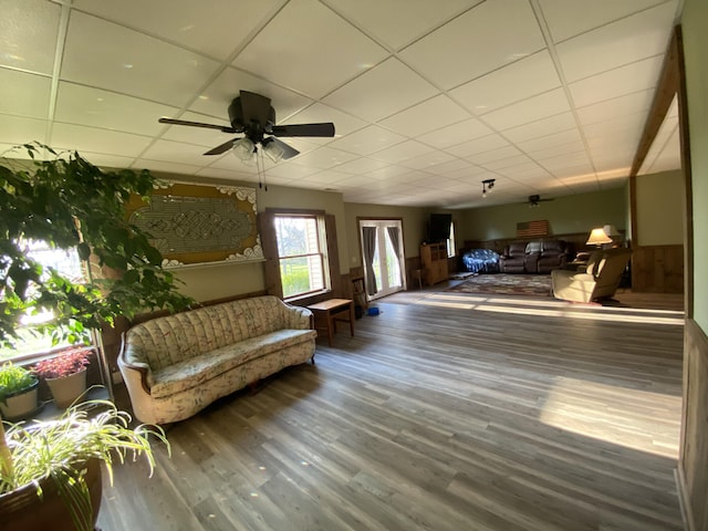 6475 S Farm Rd Unit 193, Rogersville, MO 65742 - living room featuring a drop ceiling, wood finished floors, and ceiling fan