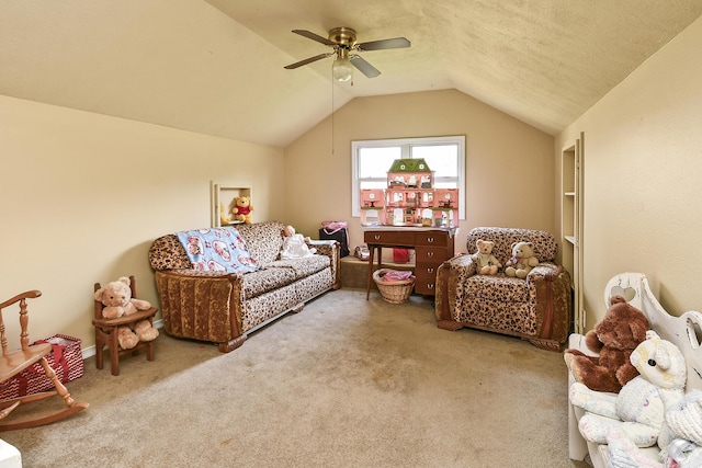 living room featuring vaulted ceiling, carpet flooring, and ceiling fan