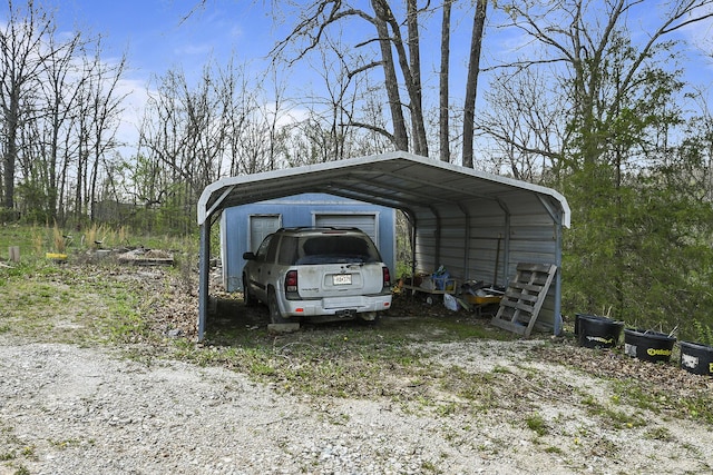 view of vehicle parking featuring a detached carport