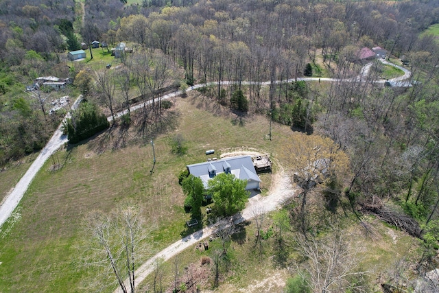 bird's eye view with a view of trees