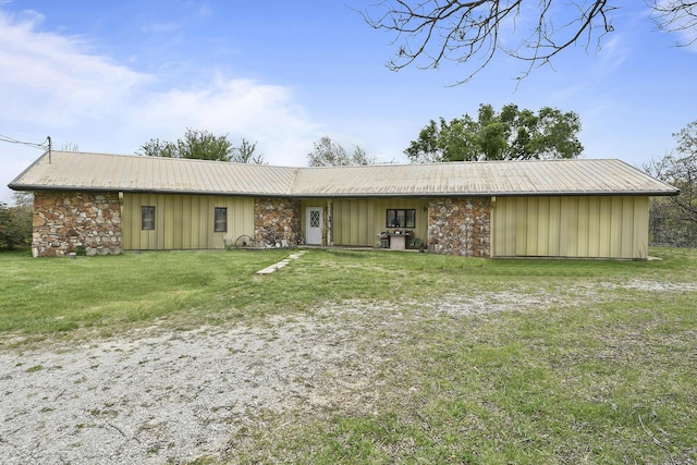 8100 Creek Rd, Hartville, MO 65667 - ranch-style home with board and batten siding, stone siding, metal roof, and a front yard