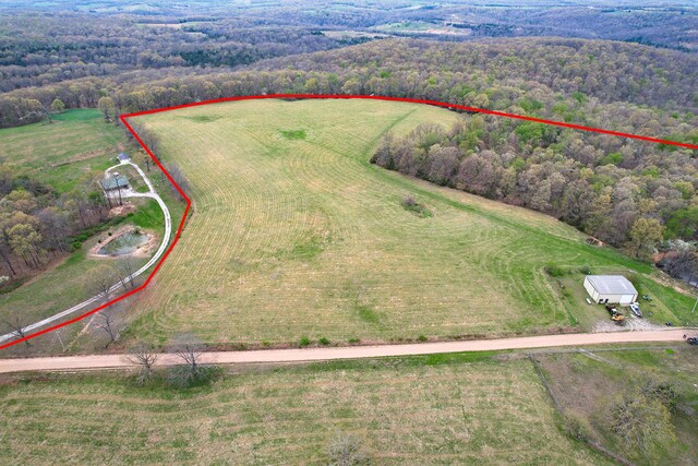 8100 Creek Rd, Hartville, MO 65667 - aerial view featuring a rural view and a wooded view