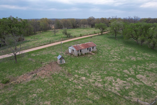 8100 Creek Rd, Hartville, MO 65667 - view of yard featuring an outdoor structure, a rural view, and an outbuilding