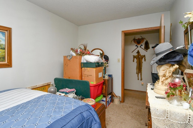 8100 Creek Rd, Hartville, MO 65667 - bedroom with a textured ceiling and carpet flooring