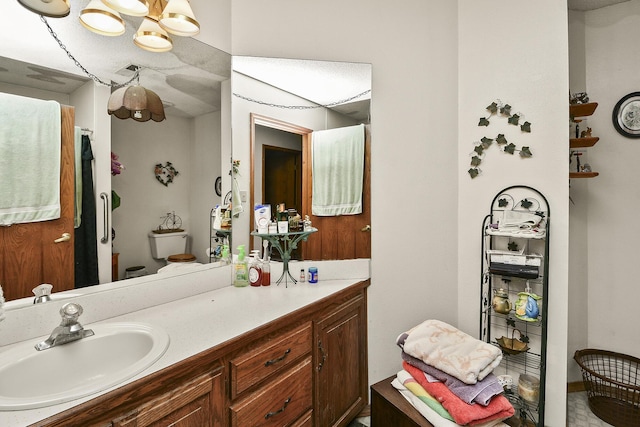 8100 Creek Rd, Hartville, MO 65667 - bathroom with vanity and a chandelier