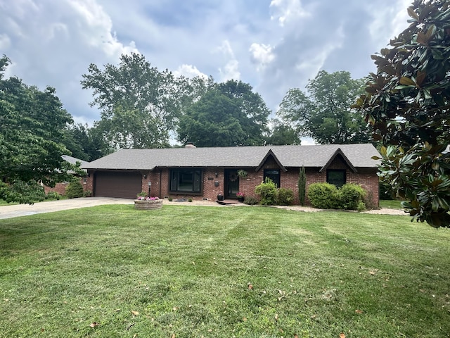 2036 E Greenwood St, Springfield, MO 65804 - single story home featuring a garage, brick siding, concrete driveway, and a front lawn