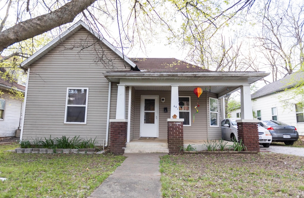 bungalow-style home featuring covered porch