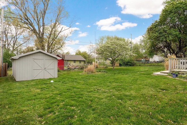 4542 S Holiday Ave, Springfield, MO 65810 - view of yard with fence, an outbuilding, and a storage shed