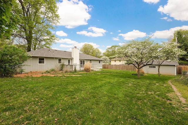 4542 S Holiday Ave, Springfield, MO 65810 - view of yard featuring fence and a deck