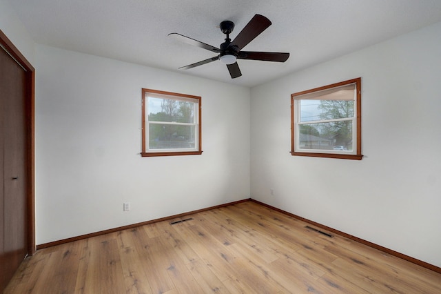4542 S Holiday Ave, Springfield, MO 65810 - interior space with baseboards, light wood-style flooring, and visible vents