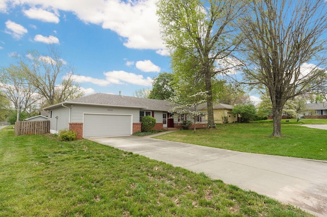 4542 S Holiday Ave, Springfield, MO 65810 - ranch-style home featuring driveway, fence, brick siding, an attached garage, and a front yard