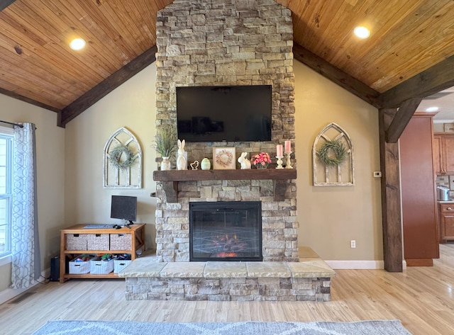 living area with baseboards, a fireplace, lofted ceiling, wooden ceiling, and wood finished floors