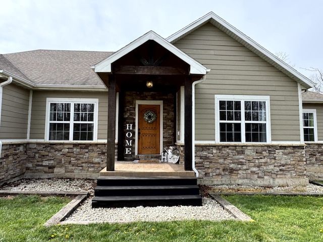 exterior space featuring stone siding