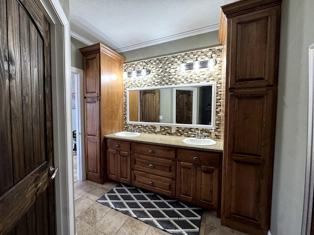 bathroom with decorative backsplash, double vanity, a sink, and ornamental molding