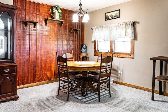 133 Sutherland Ave, Mountain Grove, MO 65711 - carpeted dining space featuring baseboards and a chandelier