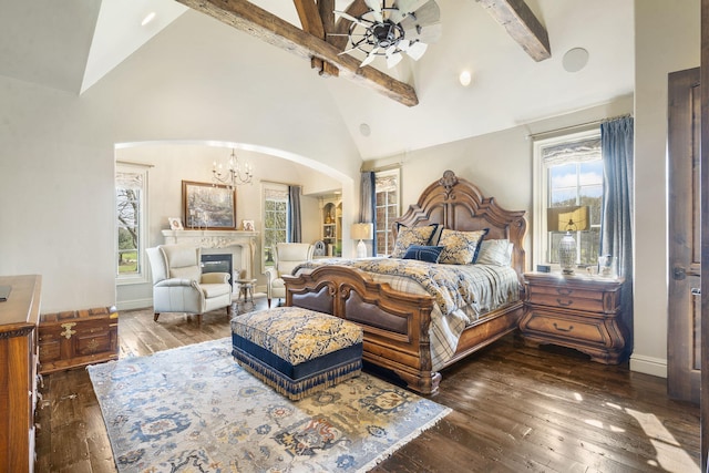 845 W Farm Road 96, Springfield, MO 65803 - bedroom featuring high vaulted ceiling, wood-type flooring, multiple windows, and beamed ceiling