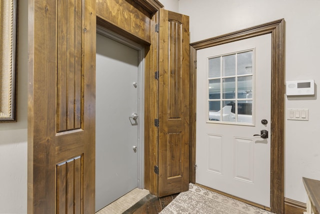 845 W Farm Road 96, Springfield, MO 65803 - doorway to outside with dark wood-style floors